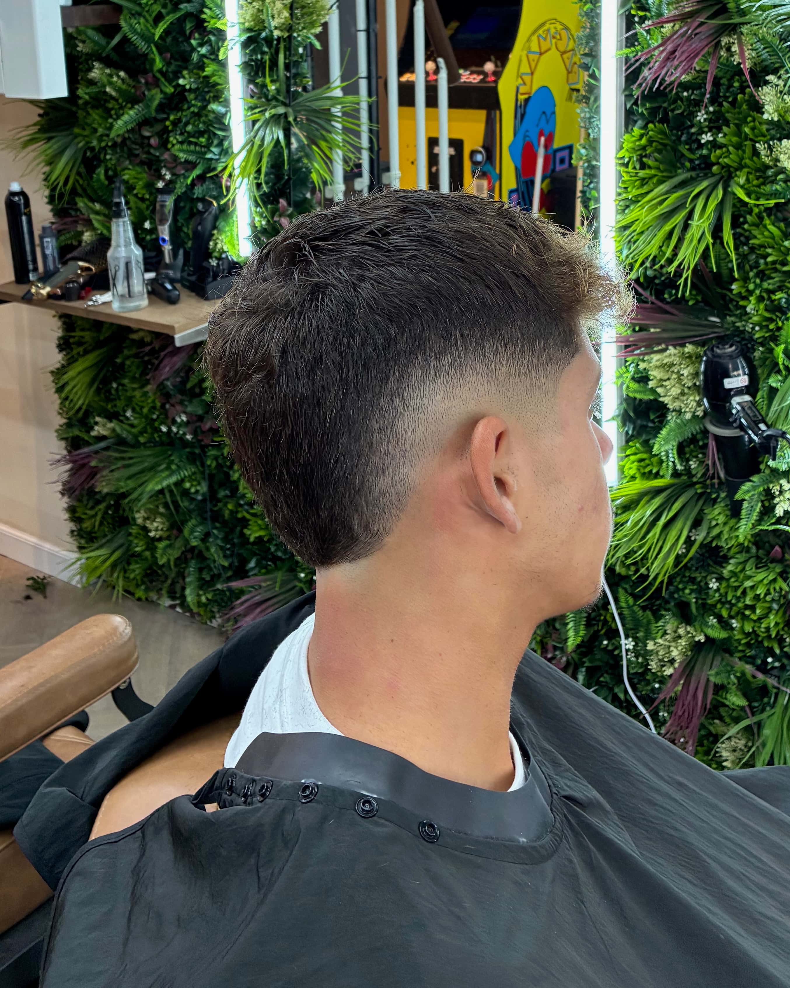 הגרסה המודרנית והטרנדית לתספורת המולט, עם דירוג נקי ומדויק שנעשתה במספרת ברברוסה בתל אביב.